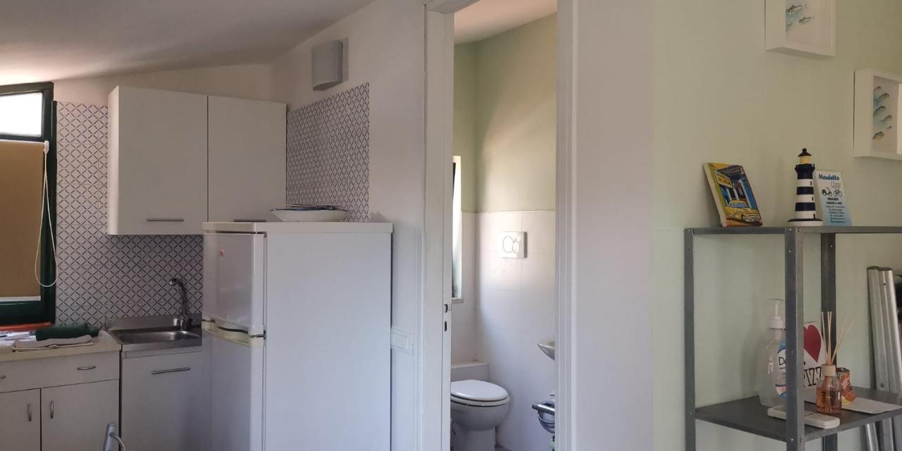 Monolocale I Delfini Apartment มอนเดลโล ภายนอก รูปภาพ