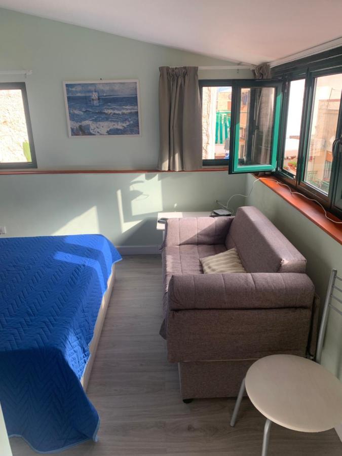 Monolocale I Delfini Apartment มอนเดลโล ภายนอก รูปภาพ